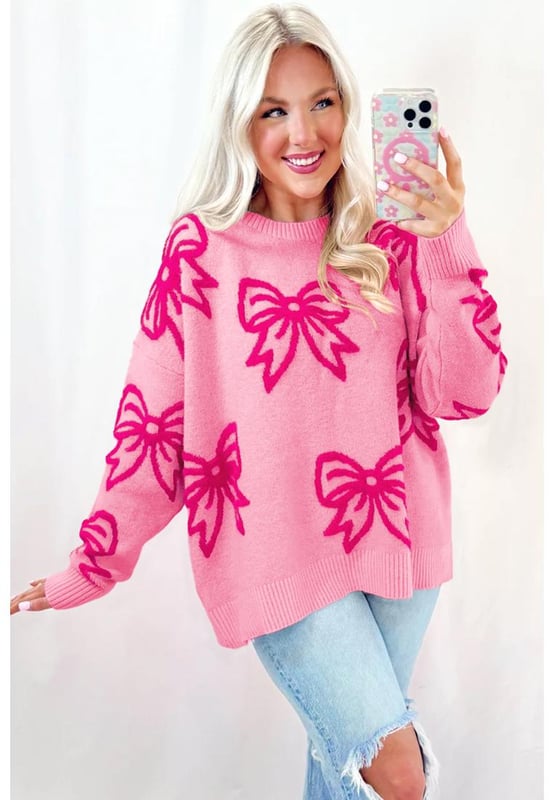 Feminine bow pattern
  Loose fit suitable for all body shapes
  Drop shoulder design for a laid
  back look
  Soft and warm knit material
  Ideal for cold winter season