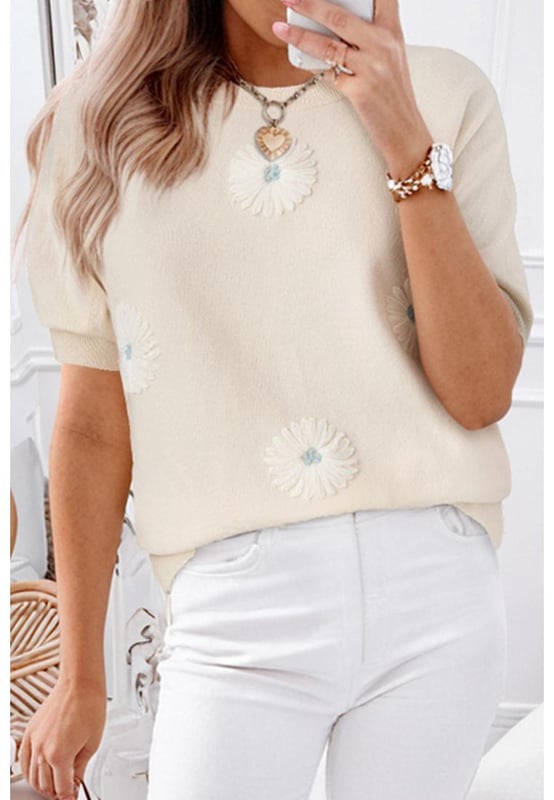 Our styles are designed with a trendy fitted look in mind following an international size standard. For the best fit we suggest choosing one size up from your usual. Be sure to check our sizing chart to find your perfect match!
  Beige flower pattern short sleeve knitted top
  Soft and cozy knitted fabric
  Stylish short sleeves
  Classic crew neck design
  Available in sizes S M L and XL
  High elasticity for a comfortable fit
Material: 50% Viscose 28% Polyester 22% Polyamide