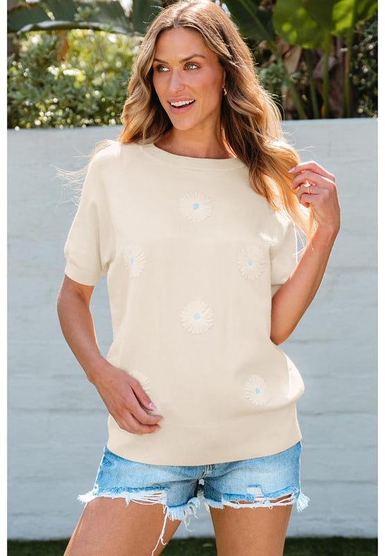 Our styles are designed with a trendy fitted look in mind following an international size standard. For the best fit we suggest choosing one size up from your usual. Be sure to check our sizing chart to find your perfect match!
  Beige flower pattern short sleeve knitted top
  Soft and cozy knitted fabric
  Stylish short sleeves
  Classic crew neck design
  Available in sizes S M L and XL
  High elasticity for a comfortable fit
Material: 50% Viscose 28% Polyester 22% Polyamide