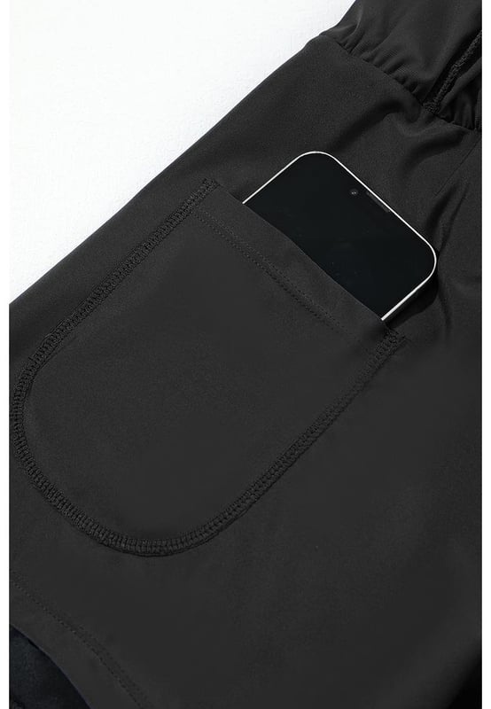 Our styles are designed with a trendy fitted look in mind following an international size standard. For the best fit we suggest choosing one size up from your usual. Be sure to check our sizing chart to find your perfect match!
  Solid color for a sleek and versatile look
  Invisible pocket for convenient and secure storage
  Wide waistband provides both comfort and style
  Quick
  dry fabric ensures a comfortable and practical experience
  High elasticity for a perfect fit
Material: 75% Polyamide 25% Elastane