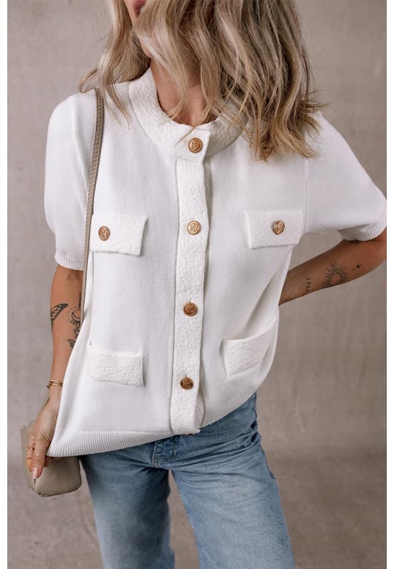 Our styles are designed with a trendy fitted look in mind following an international size standard. For the best fit we suggest choosing one size up from your usual. Be sure to check our sizing chart to find your perfect match!
  Unique gold button front design
  Textured lightweight knit fabric
  Perfect for summer wear
  Pairs well with both pants and skirts
  Available in sizes S M L and XL
  High elasticity
Material: 50% Viscose 28% Polyester 22% Polyamide