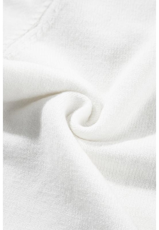 Our styles are designed with a trendy fitted look in mind following an international size standard. For the best fit we suggest choosing one size up from your usual. Be sure to check our sizing chart to find your perfect match!
  Adorable flower applique adds a charming touch
  Short sleeves style for a versatile and stylish look
  Breathable soft and cozy knitwear
  Perfect for layering or wearing on its own
  Available in various sizes to suit your style
  High elasticity for a comfortable fit
Material: 50% Viscose 28% Polyester 22% Polyamide