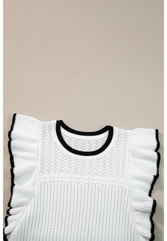 Nuestros estilos están diseñados con un look ajustado y moderno, siguiendo un estándar de talla internacional. Para el mejor ajuste, sugerimos elegir una talla más de la habitual. ¡Asegúrate de consultar nuestra tabla de tallas para encontrar tu coincidencia perfecta!  
Bordes con volantes de contraste para un look elegante y llamativo  
Exquisito tejido de ganchillo para una apariencia elegante y de alta calidad  
Longitud cropped ideal para combinar con prendas de cintura alta  
Perfecto para varias ocasiones sociales para elevar tu look  
Alta elasticidad para un ajuste cómodo  
Material: 75% Viscosa 25% Poliéster