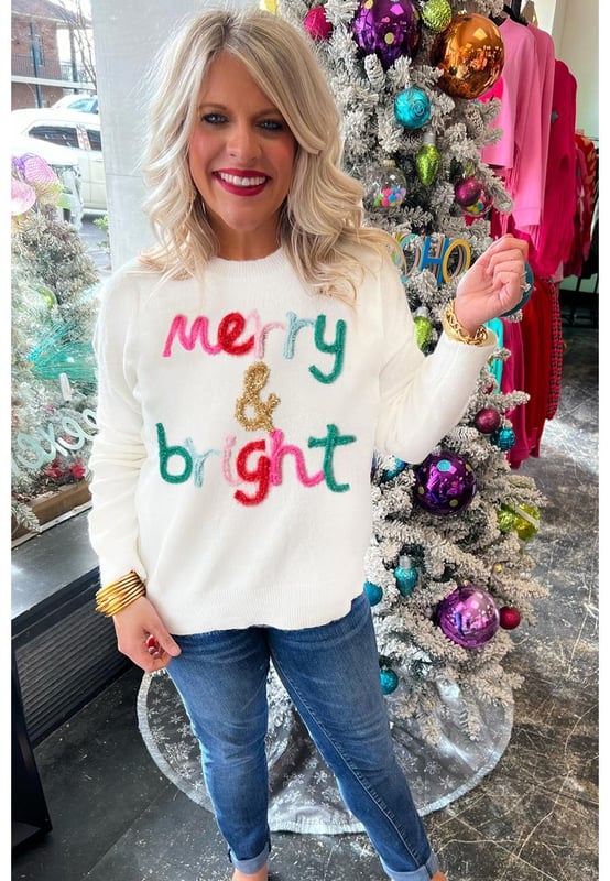 Suéter casual blanco Merry & Bright de cuello redondo  
Material de alta calidad  
Cómodo y acogedor de usar  
Cuello redondo y mangas largas  
Diseño Merry & Bright en la parte frontal  
Elección ideal para la temporada festiva  
Apropiado tanto para hombres como para mujeres  
Prenda versátil para tu guardarropa  