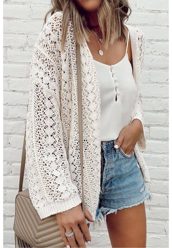White Stylish Hollow Out Knit Drop Shoulder Cardigan
  Timeless elegance with intricate hollow out design
  Knit construction for comfort and warmth
  Drop shoulder style for a relaxed chic vibe
  Captivating patterns and textures
  Refer to size chart for perfect fit
Material: 55% Acrylic 45% Cotton