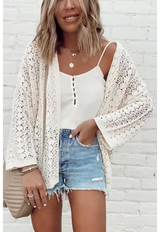 White Stylish Hollow Out Knit Drop Shoulder Cardigan
  Timeless elegance with intricate hollow out design
  Knit construction for comfort and warmth
  Drop shoulder style for a relaxed chic vibe
  Captivating patterns and textures
  Refer to size chart for perfect fit
Material: 55% Acrylic 45% Cotton