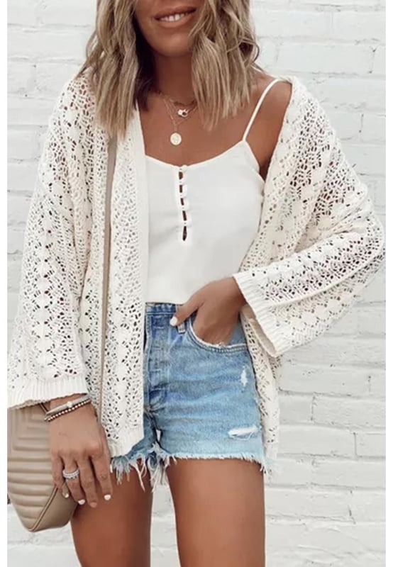 White Stylish Hollow Out Knit Drop Shoulder Cardigan
  Timeless elegance with intricate hollow out design
  Knit construction for comfort and warmth
  Drop shoulder style for a relaxed chic vibe
  Captivating patterns and textures
  Refer to size chart for perfect fit
Material: 55% Acrylic 45% Cotton