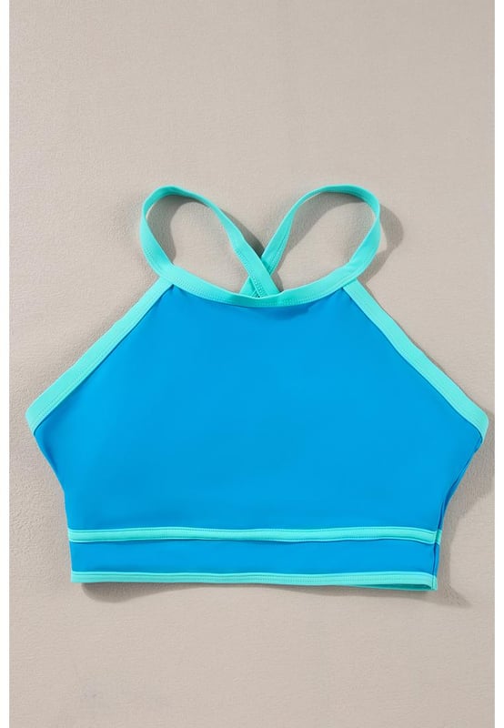 Blue Contrast Trim Crisscross Back High Waisted Bikini
  Eye
  catching contrast trim
  Stylish crisscross back design
  Flattering high
  waisted silhouette
  Comfortable and supportive for all
  day wear
  Perfect for lounging by the pool or beach
Material: 82% Polyamide 18% Elastane