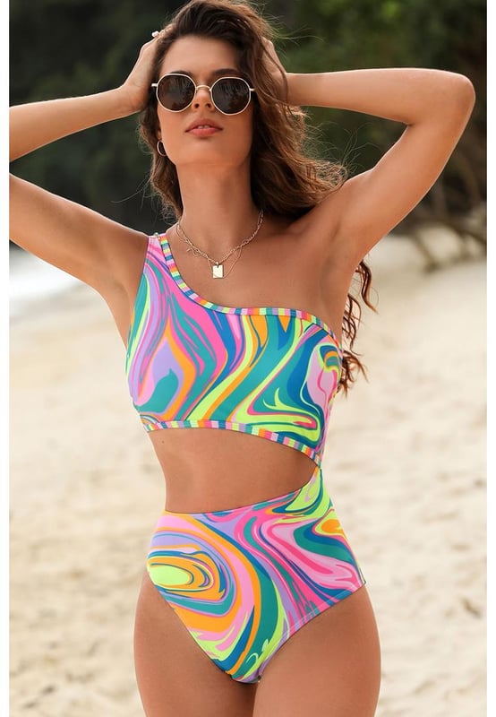 Multicolor Abstract Swirl Print Asymmetrischer Cut-Out Einteiler Badeanzug  
Modisch und auffällig mit abstraktem Wirbel-Print  
Ein-Schulter-Design für einen schickeres und sexyeres Aussehen  
Cut-Out-Design für eine sexy Kurve  
Sexy Strandkleider und Überwürfe erhältlich für einen kompletten Look  
Dropship Einteiler Badeanzüge erhältlich im schicken Boho-Vibe mit wunderschönen Mustern  
Erhältlich in den Größen S, M, L und XL  
Hohe Elastizität für eine bequeme Passform  
Bitte beachten Sie die Größentabelle für die genaue Größenbestimmung  
Material: 85% Polyester, 15% Elastan