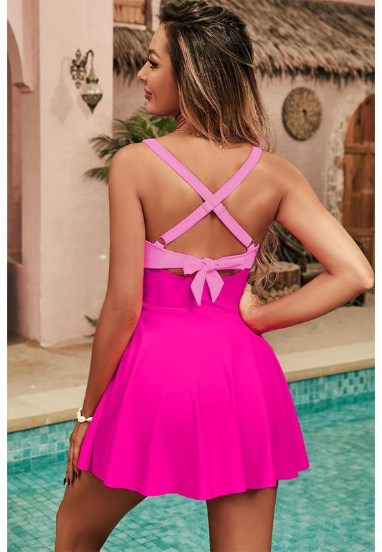 Flared silhouette
  Crisscross back straps
  V
  neckline
  Sleeveless design
  High
  quality material
  Available in multiple sizes