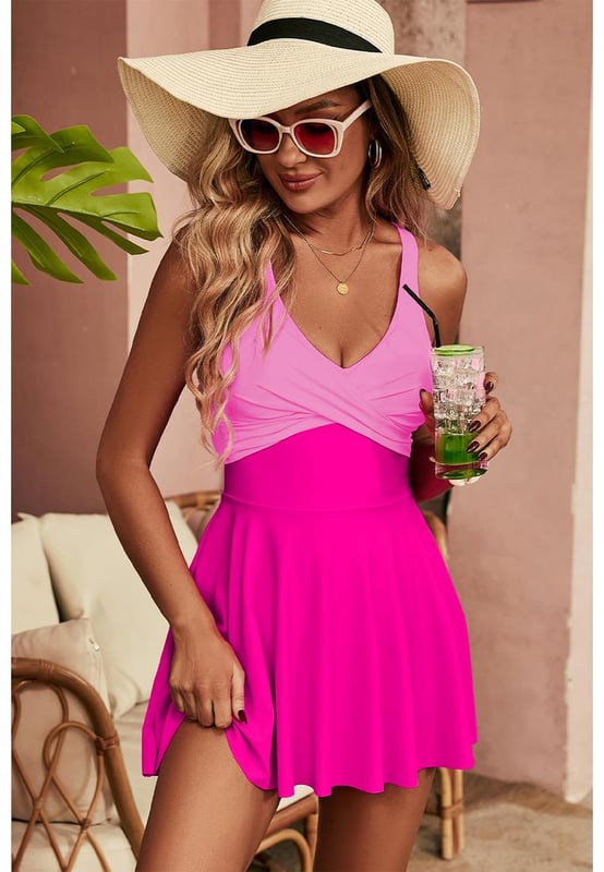 Flared silhouette
  Crisscross back straps
  V
  neckline
  Sleeveless design
  High
  quality material
  Available in multiple sizes