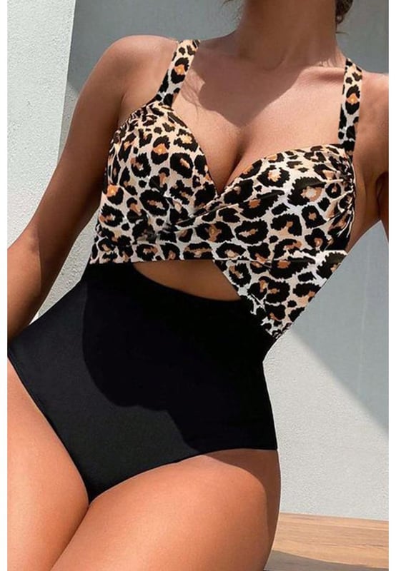 Zweifarbige Gestaltung  
Überschlagene Vorderseite  
Ausschnitt vorne  
Rückenfreier Stil  
Verstellbare Bindung  
Erhältlich in den Größen S bis 2XL  
Material: 82 % Polyester, 18 % Spandex