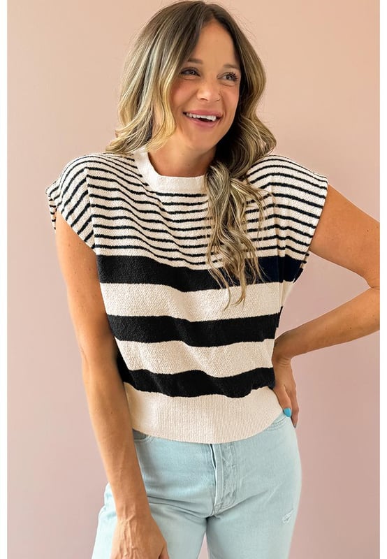 Our styles are designed with a trendy fitted look in mind following an international size standard. For the best fit we suggest choosing one size up from your usual. Be sure to check our sizing chart to find your perfect match!
  Stylish patterned design with mixed stripes
  Round neck
  Relaxed silhouette
  Sleeveless knit
  High
  quality materials
  Stylish and comfortable
  Effortless elegance
  Versatile addition to any wardrobe