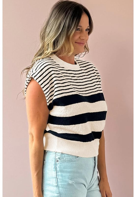 Our styles are designed with a trendy fitted look in mind following an international size standard. For the best fit we suggest choosing one size up from your usual. Be sure to check our sizing chart to find your perfect match!
  Stylish patterned design with mixed stripes
  Round neck
  Relaxed silhouette
  Sleeveless knit
  High
  quality materials
  Stylish and comfortable
  Effortless elegance
  Versatile addition to any wardrobe