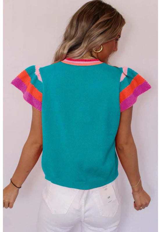 Nuestros estilos están diseñados con un look ajustado y moderno en mente, siguiendo un estándar de tallas internacional. Para el mejor ajuste, sugerimos elegir una talla más de la habitual. ¡Asegúrate de consultar nuestra tabla de tallas para encontrar tu coincidencia perfecta!
  Color turquesa
  Mangas femeninas con volantes
  Cuello de tripulación y mangas en contraste
  Estilo de ajuste relajado
  Adecuado para climas cálidos
  Material de punto
  Estilo chic para todas las estaciones