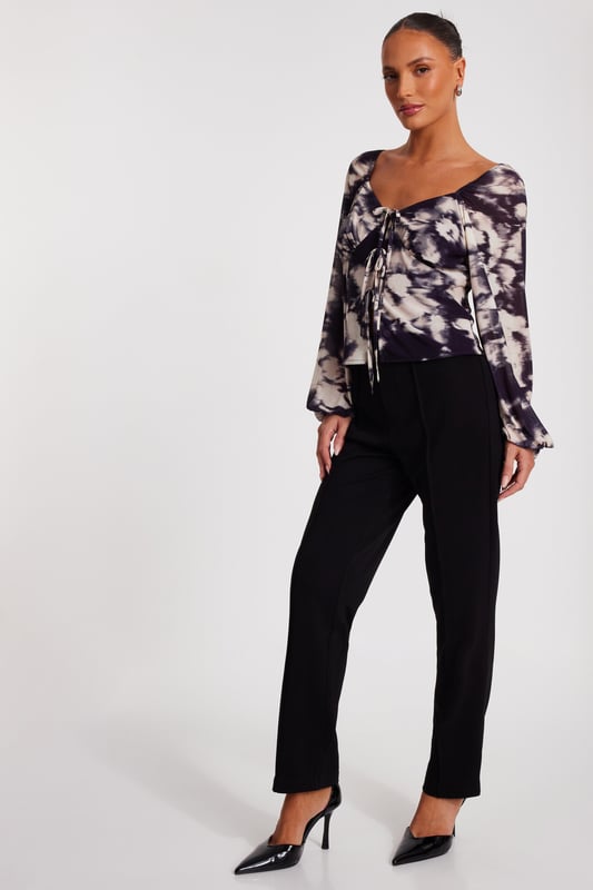 - Mesh finish - Marble print - Tie front - Balloon sleeves - Model height: 5'6" - Model wears uk 8 / us 4 / eur 36 - Always check the wash care label - Cool hand wash with mild detergent