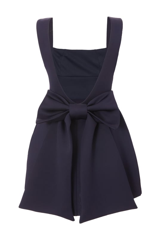- Bow detail - Square neck - Low back - Skater style - Model height: 5'9" - Model wears uk 8 / us 4 / eur 36 - Always check the wash care label - Cool hand wash with mild detergent