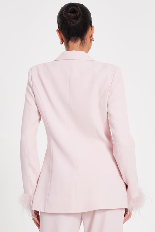 - Woven finish - Double breasted - Feather trim - Longline style - Model height: 5'6" - Model wears uk 8 / us 4 / eur 36 - Contains non-textile parts of animal origin - Always check the wash care label - Cool hand wash with mild detergent