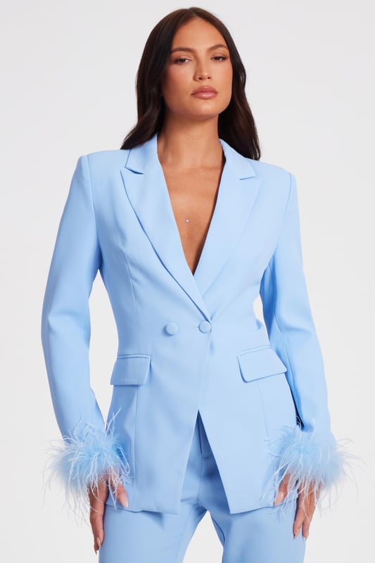- Woven finish - Double breasted - Feather trim - Longline style - Model height: 5'6" - Model wears uk 8 / us 4 / eur 36 - Contains non-textile parts of animal origin - Always check the wash care label - Cool hand wash with mild detergent