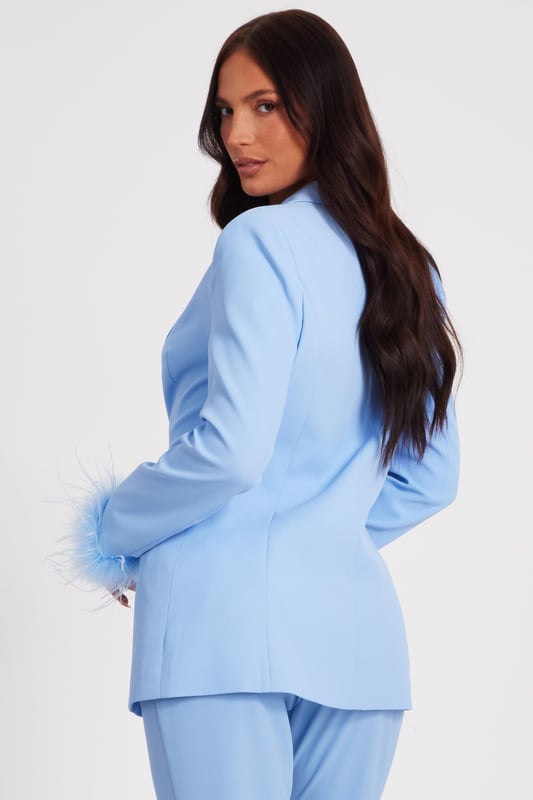 - Woven finish - Double breasted - Feather trim - Longline style - Model height: 5'6" - Model wears uk 8 / us 4 / eur 36 - Contains non-textile parts of animal origin - Always check the wash care label - Cool hand wash with mild detergent