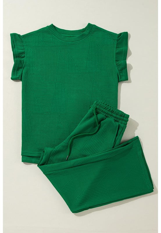 Our styles are designed with a trendy fitted look in mind following an international size standard. For the best fit we suggest choosing one size up from your usual. Be sure to check our sizing chart to find your perfect match!
  Dark green two
  piece set
  Includes ruffled sleeve summer top and cropped loose pants
  Crew neck top with feminine ruffled sleeves
  Cropped pants with adjustable drawstring waistline
  Made from textured fabric
  Ideal for summer outings
Material: 97% Polyester 3% Elastane