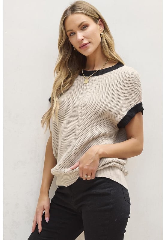 Our styles are designed with a trendy fitted look in mind following an international size standard. For the best fit we suggest choosing one size up from your usual. Be sure to check our sizing chart to find your perfect match!
  Light French Beige color with contrast trim
  Round neck design
  Batwing sleeves for a romantic and fashionable look
  Short sleeve for a summer
  friendly style
  Cozy and chic knit material
  Available in sizes S M L XL
  Medium
  high elasticity for a comfortable fit