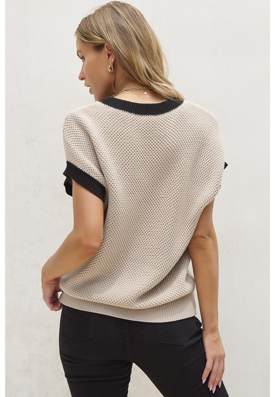 Our styles are designed with a trendy fitted look in mind following an international size standard. For the best fit we suggest choosing one size up from your usual. Be sure to check our sizing chart to find your perfect match!
  Light French Beige color with contrast trim
  Round neck design
  Batwing sleeves for a romantic and fashionable look
  Short sleeve for a summer
  friendly style
  Cozy and chic knit material
  Available in sizes S M L XL
  Medium
  high elasticity for a comfortable fit