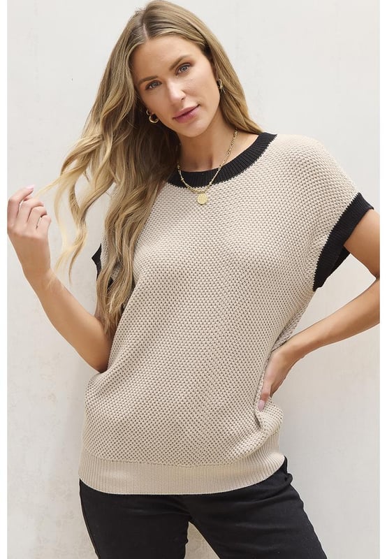 Our styles are designed with a trendy fitted look in mind following an international size standard. For the best fit we suggest choosing one size up from your usual. Be sure to check our sizing chart to find your perfect match!
  Light French Beige color with contrast trim
  Round neck design
  Batwing sleeves for a romantic and fashionable look
  Short sleeve for a summer
  friendly style
  Cozy and chic knit material
  Available in sizes S M L XL
  Medium
  high elasticity for a comfortable fit