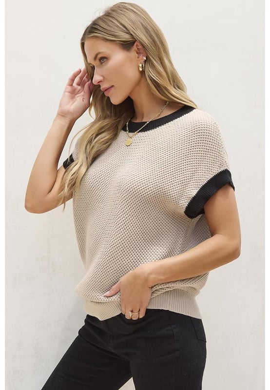 Our styles are designed with a trendy fitted look in mind following an international size standard. For the best fit we suggest choosing one size up from your usual. Be sure to check our sizing chart to find your perfect match!
  Light French Beige color with contrast trim
  Round neck design
  Batwing sleeves for a romantic and fashionable look
  Short sleeve for a summer
  friendly style
  Cozy and chic knit material
  Available in sizes S M L XL
  Medium
  high elasticity for a comfortable fit