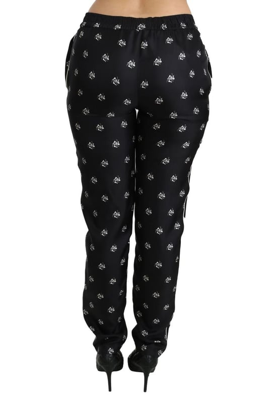 Merk: Dolce & Gabbana
  Conditie: Gloednieuw met tags
  Authenticiteit: 100% authentiek
  Stijl: Skinny broek met middelhoge taille
  Pasvorm: Slim fit
  Materiaal: 100% Zijde
  Kleur: Zwart gedrukt
  Details van het logo
  Herkomst: Gemaakt in Italie