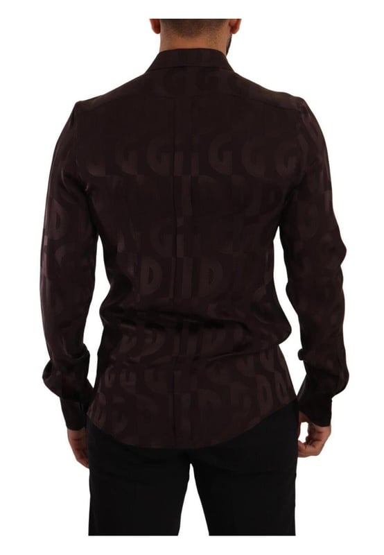 100% Authentic Dolce &amp; Gabbana GOLD silk shirt
  Classic neck with long sleeves
  Button down closure
  Logo print
  Made in Italy
Material: 100% Silk