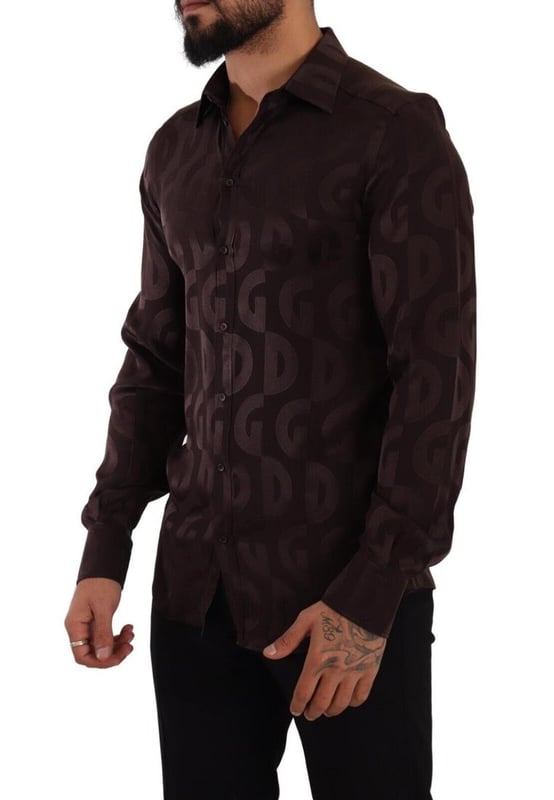 100% Authentic Dolce &amp; Gabbana GOLD silk shirt
  Classic neck with long sleeves
  Button down closure
  Logo print
  Made in Italy
Material: 100% Silk