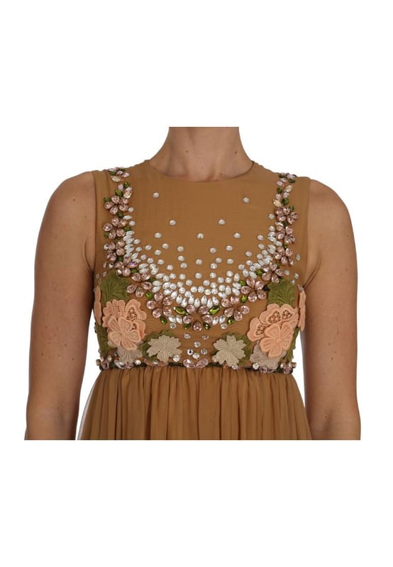 Dolce & Gabbana Exclusive Masterpiece Dress
  Brand new with tags
  100% Authentic
  Above knee
  length A
  line silhouette
  Color: Gold
  Crystals: Clear and pink
  Multicolor floral Ricamo applique
  Back zipper closure
  Silk blend inner lining
  Logo details
  Made in Italy
Material: 100% SILK