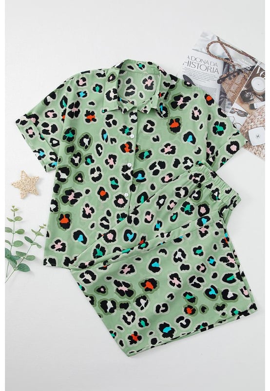 Green Leopard Print Short Sleeve Shirt and Wide Leg Pants Set
  Coordinated two
  piece set with mix
  and
  match possibilities
  Trendy leopard print for a bold and stylish touch
  Short sleeve shirt keeps you cool and chic
  Wide leg pants offer a trendy and flattering silhouette
Material: 100% Polyester