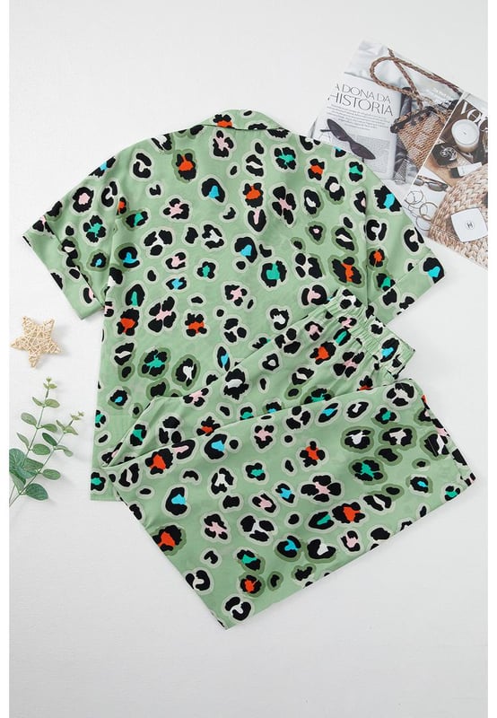 Green Leopard Print Short Sleeve Shirt and Wide Leg Pants Set
  Coordinated two
  piece set with mix
  and
  match possibilities
  Trendy leopard print for a bold and stylish touch
  Short sleeve shirt keeps you cool and chic
  Wide leg pants offer a trendy and flattering silhouette
Material: 100% Polyester