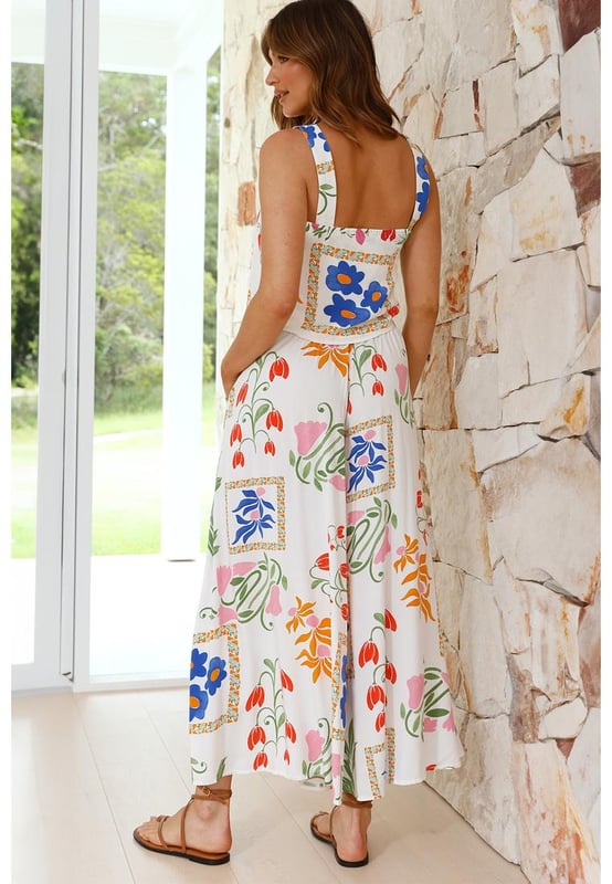 Our styles are designed with a trendy fitted look in mind following an international size standard. For the best fit we suggest choosing one size up from your usual. Be sure to check our sizing chart to find your perfect match!
  White Colorful Printed Square Neck Tank and Wide Leg Pants Set
  Square
  neck tank with wide straps
  Wide
  leg pants for a flowy silhouette
  Feminine floral design
  Soft comfortable fabric for all
  day wear
Material: 100% Viscose