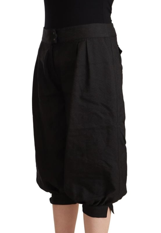 Merk: GF FERRE
  Model: Cropped harembroek
  Kleur: Zwart
  Rits
  en knoopsluiting
  Details van het logo
  Vervaardigd in Italie
  Materiaal: 48% Viscose 35% Polyester 12% Scheerwol 5% Metaal