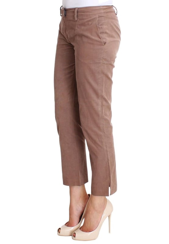 Costume National Women's Brown Cropped Corduroys Pants Brand: Costume National CNC
Condition: Brand New with Tags
Style: Cropped Corduroy Pants
Color: Brown
Material: Cotton Elastane
Closure: Zipper Fly
Pockets: Two Front and Two Back Pockets
Logo Details: Costume National CNC
Origin: Made in Italy
Gender: Women