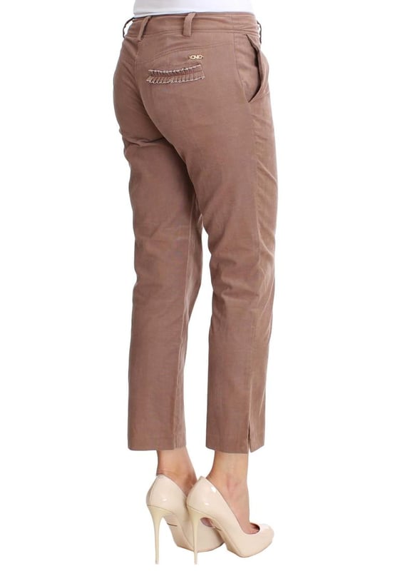 Costume National Women's Brown Cropped Corduroys Pants Brand: Costume National CNC
Condition: Brand New with Tags
Style: Cropped Corduroy Pants
Color: Brown
Material: Cotton Elastane
Closure: Zipper Fly
Pockets: Two Front and Two Back Pockets
Logo Details: Costume National CNC
Origin: Made in Italy
Gender: Women