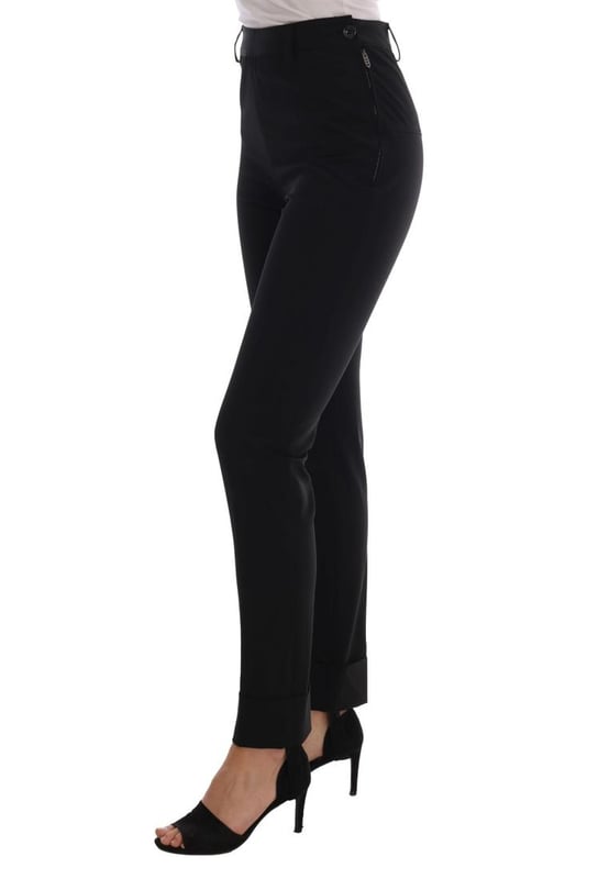 Brand new with tags
  Made in Italy
  Stirrup pants with a sleek black color
  Logo details for a touch of luxury
  Crafted from 90% polyester and 10% elastane
  Comfortable and flattering fit
Material: 90% Polyester 10% Elastan