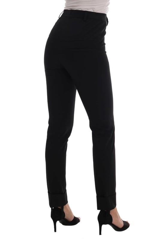 Brand new with tags
  Made in Italy
  Stirrup pants with a sleek black color
  Logo details for a touch of luxury
  Crafted from 90% polyester and 10% elastane
  Comfortable and flattering fit
Material: 90% Polyester 10% Elastan