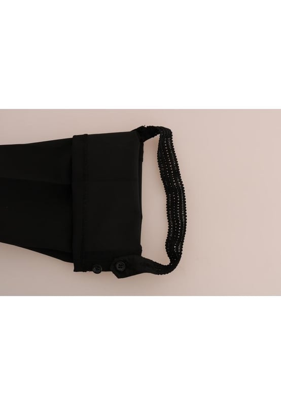 Brand new with tags
  Made in Italy
  Stirrup pants with a sleek black color
  Logo details for a touch of luxury
  Crafted from 90% polyester and 10% elastane
  Comfortable and flattering fit
Material: 90% Polyester 10% Elastan