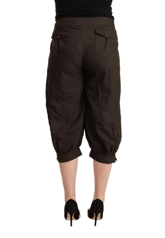 GF Ferre Women's Brown Viscose Cropped Harem Pants Brand: GF FERRE
Mid waist cropped harem pants
Color: Brown
Zipper and button closure
Logo details
Made in Italy
Material: 48% Viscose 35% Polyester 12% Virgin Wool 5% Metal
Quality and craftsmanship