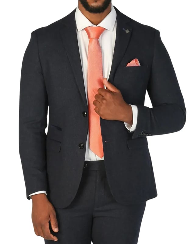 Refined and timeless, this navy blue blazer is crafted from a premium wool blend tweed that combines warmth, durability, and an effortlessly smart appearance. Whether styled for business or special occasions, the tailored fit ensures a sleek silhouette while maintaining day-long comfort. The deep navy tone adds versatility, allowing for easy pairing with everything from dress trousers to chinos. Finished with precise stitching and fine craftsmanship, this piece is made to elevate any wardrobe.
Premium wool-blend tweed for comfort, warmth, and durability
Tailored fit for a modern, flattering silhouette
Classic navy blue color for versatile styling
Detailed stitching and high-quality finish for refined appeal
Suitable for formal, business, and smart-casual occasions