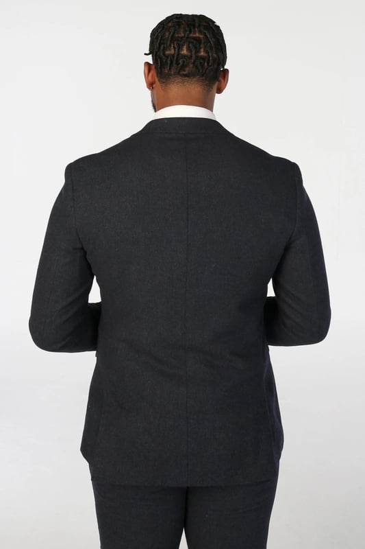Refined and timeless, this navy blue blazer is crafted from a premium wool blend tweed that combines warmth, durability, and an effortlessly smart appearance. Whether styled for business or special occasions, the tailored fit ensures a sleek silhouette while maintaining day-long comfort. The deep navy tone adds versatility, allowing for easy pairing with everything from dress trousers to chinos. Finished with precise stitching and fine craftsmanship, this piece is made to elevate any wardrobe.
Premium wool-blend tweed for comfort, warmth, and durability
Tailored fit for a modern, flattering silhouette
Classic navy blue color for versatile styling
Detailed stitching and high-quality finish for refined appeal
Suitable for formal, business, and smart-casual occasions
