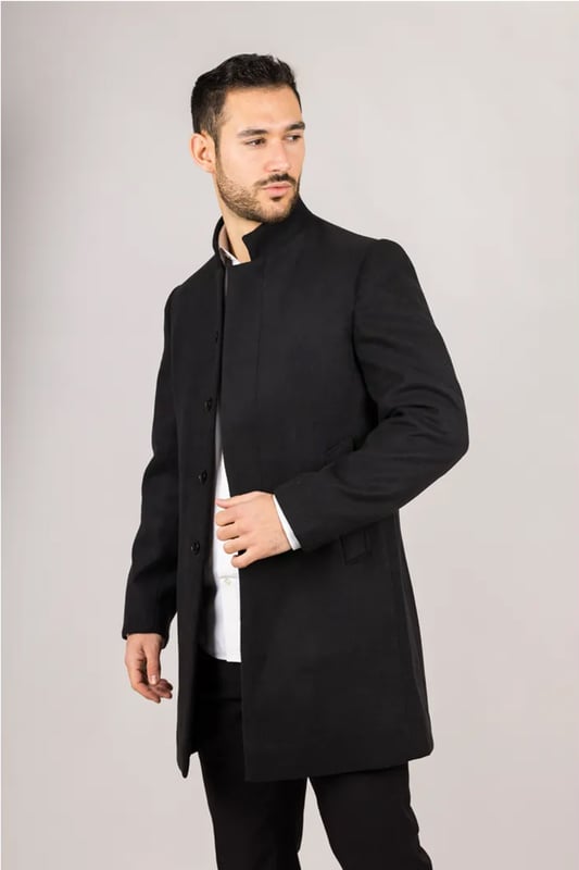 Elevate your outerwear with this refined wool blend overcoat, designed for both style and functionality. Crafted from a premium wool blend, it offers reliable warmth and durability—perfect for colder months. The sophisticated Nehru collar introduces a modern twist to classic tailoring, while the tailored fit ensures a sharp silhouette without sacrificing comfort. Finished with a discreet button closure, this coat delivers a clean, minimalist aesthetic suitable for formal and smart-casual ensembles alike.
Wool Blend Fabric: Made from 85% wool and 15% polyester for warmth, structure, and long-lasting wear.
Sophisticated Nehru Collar: Adds a distinctive and polished touch to any outfit.
Tailored Fit Design: Enhances your silhouette while maintaining comfortable movement.
Discreet Button Closure: Offers a clean, streamlined look with hidden front buttons.
Material Composition: 85% Wool, 15% Polyester.
