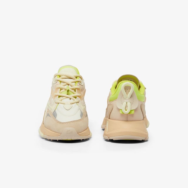 Women's Lacoste L003 Neo Tech Sneakers- Premium mixed upper including canvas  nylon  leather and mesh- Heel lacing detail inspired by the original L003- Lacoste Active branding printed on centre panel- Textured  robust  high-grip rubber outsole- Signature crocodile printed on tongue and heel counter- Ref: 48SFA00876H3