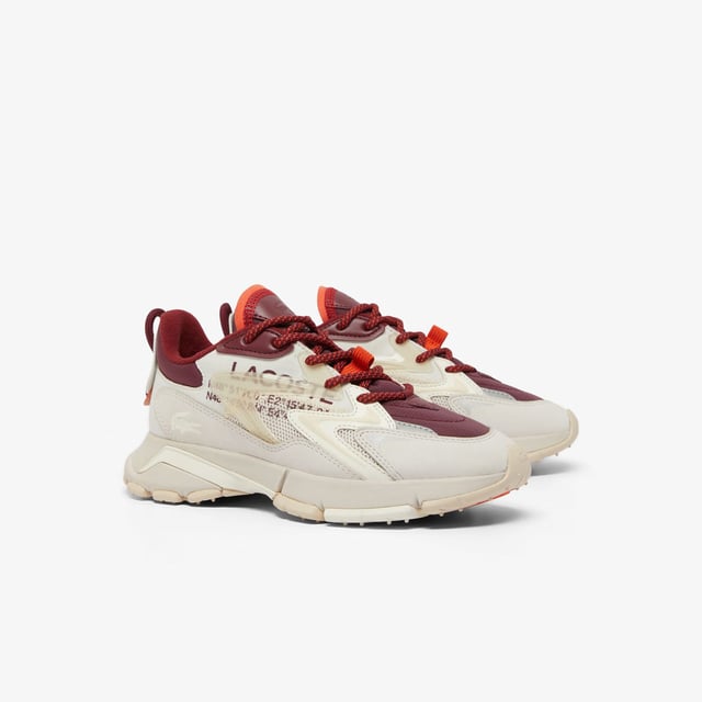 Women's Lacoste L003 Neo Tech Sneakers- Premium mixed upper including canvas  nylon  leather and mesh- Heel lacing detail inspired by the original L003- Lacoste Active branding printed on centre panel- Textured  robust  high-grip rubber outsole- Signature crocodile printed on tongue and heel counter- Ref: 48SFA0087OW9