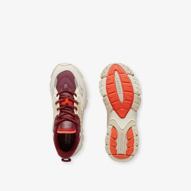 Women's Lacoste L003 Neo Tech Sneakers- Premium mixed upper including canvas  nylon  leather and mesh- Heel lacing detail inspired by the original L003- Lacoste Active branding printed on centre panel- Textured  robust  high-grip rubber outsole- Signature crocodile printed on tongue and heel counter- Ref: 48SFA0087OW9