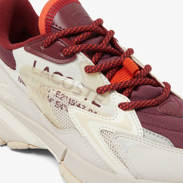 Women's Lacoste L003 Neo Tech Sneakers- Premium mixed upper including canvas  nylon  leather and mesh- Heel lacing detail inspired by the original L003- Lacoste Active branding printed on centre panel- Textured  robust  high-grip rubber outsole- Signature crocodile printed on tongue and heel counter- Ref: 48SFA0087OW9